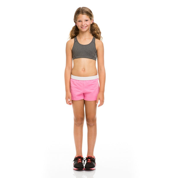 Customize a look that will never go out of style in the shorts . Favorite elastic waistband up or rolled down.Regular rise,Girl Fit.7Oz 50/50 Cotton/poly Jersey.1.25" Exp[osed Elastic waistBand V notch legs with 3 inch inseam.Sizes Waist XS(5/6)-22'' S(7)-23" M(8/10)-23.5-24" L912/140-25-26 XL-27"