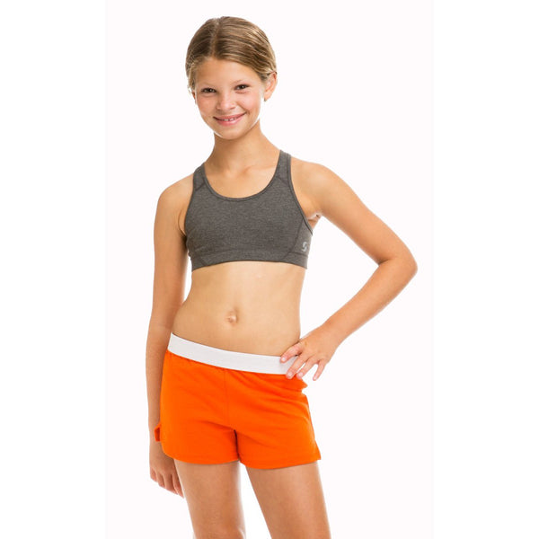 Customize a look that will never go out of style in the shorts . Favorite elastic waistband up or rolled down.Regular rise,Girl Fit.7Oz 50/50 Cotton/poly Jersey.1.25" Exp[osed Elastic waistBand V notch legs with 3 inch inseam.Sizes Waist XS(5/6)-22'' S(7)-23" M(8/10)-23.5-24" L912/140-25-26 XL-27"